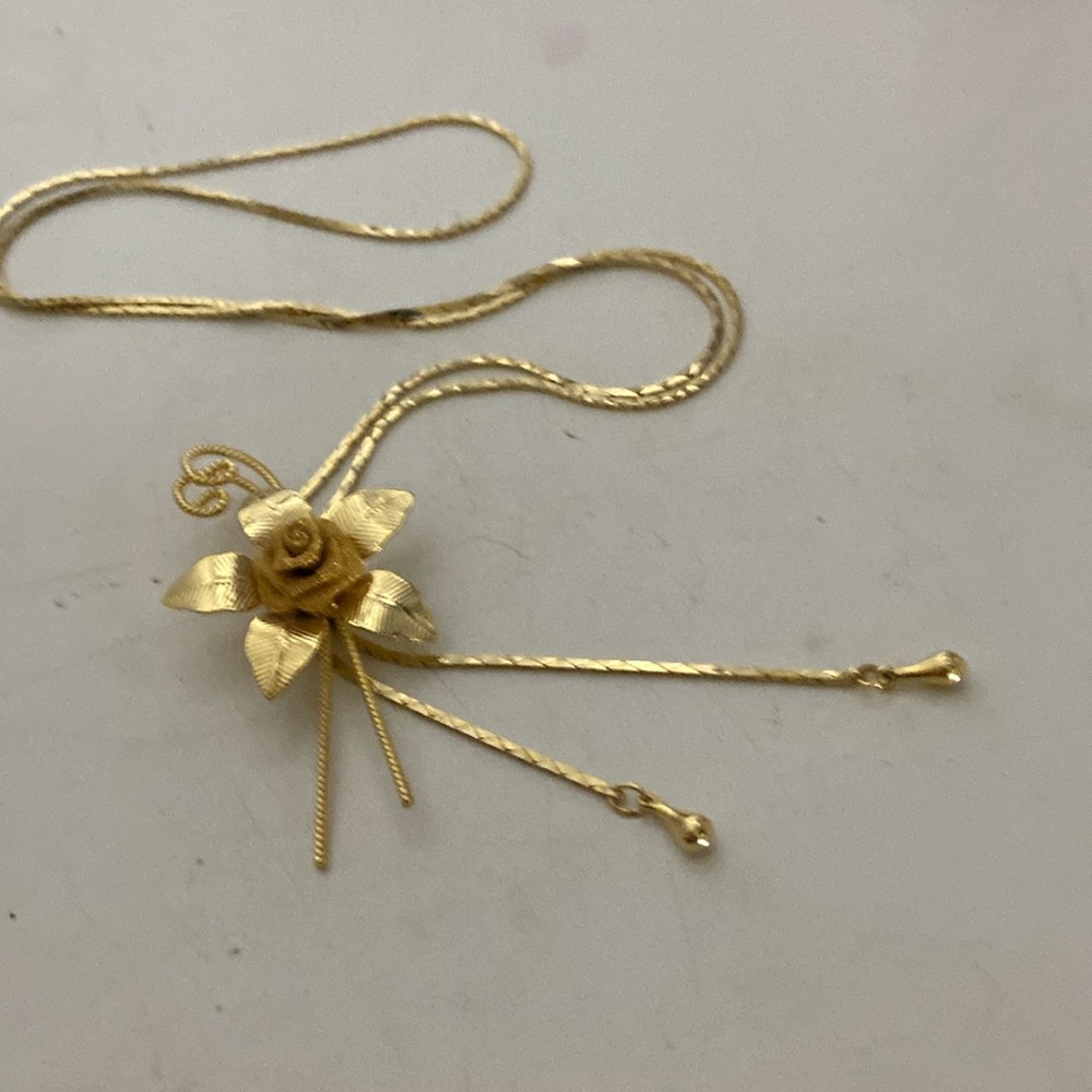 Vintage Necklace 15” long. Gold color adjustable slide strings